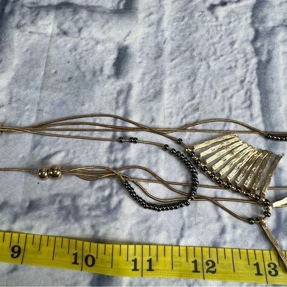 Beautiful gold tone long necklace with multi layers - Picture 10 of 10